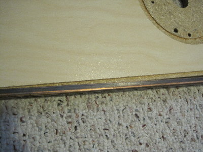 Bookshelf bracket being installed.