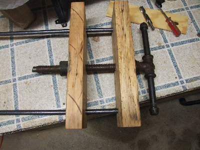 I used black water pipe for the handle. I think the look fits.